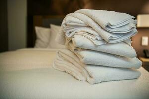 Pile of Fresh Hotel Room Towels photo