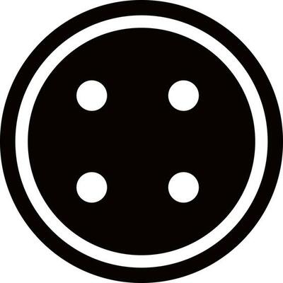 Round black and white button.