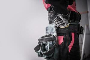 Construction Worker With Tool Belt. photo