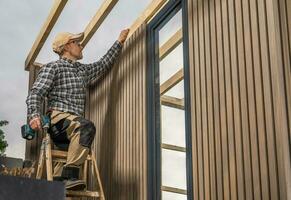 Experienced Woodworker Building Modern Backyard Garden Shed photo