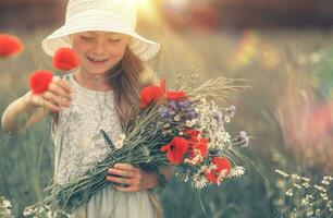 Girl and the Corn Poppy photo