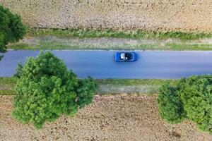 Convertible Car Countryside Road Trip Aerial View photo