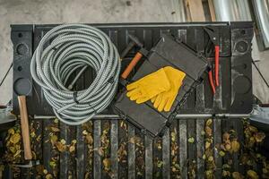 Electrician Tools and Materials on a Pickup Truck Bed Top View photo