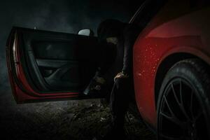 Pensive Caucasian Gangster with Handgun Inside His Car photo