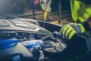 Car Mechanic Oil Check photo