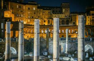 Roman Ruins Of Colosseum Columns At Night. photo