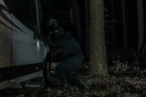 RV Camper Thief in Night Time Action photo