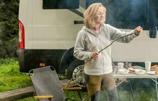 Caucasian Woman Having Fun on a Camping photo