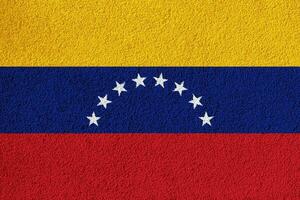 Flag of the Venezuela on a textured background. Concept collage. photo