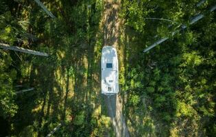 Motorhome Camper Van on a Country Road Aerial View photo