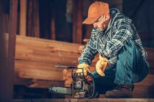 Contractor with a Chainsaw photo