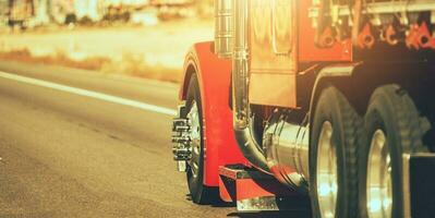 Semi Trailer Truck on a Highway Close Up photo