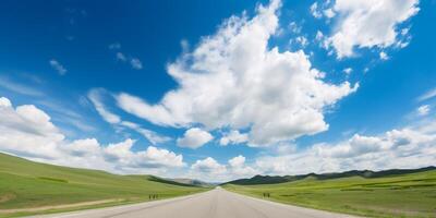 A road with a blue sky and clouds photo