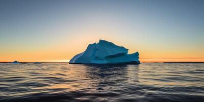 Ice berg in the water photo