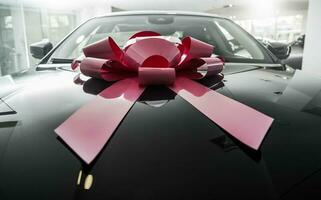 Brand New Elegant Car with Large Gift Bow photo