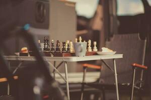 Chess Game on a Camping photo