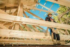 Skeleton Wood Frame Of House Building photo