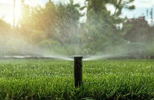 Automatic Backyard Garden Lawn Water Sprinkler photo