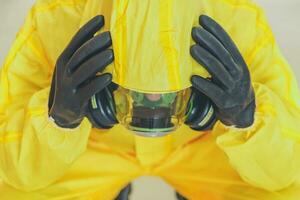 Pandemic Covid Mental Issues Concept with Men in Hazmat photo