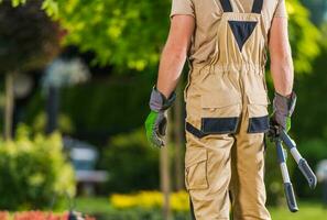 Caucasian Gardener with Scissors Gardening Tool photo