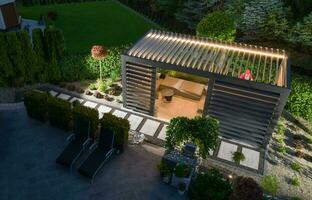 Illuminated Garden Gazebos with Mechanical Wall Blinds Aerial photo