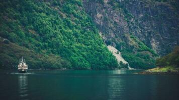 Norwegian Fjords Landscape with Ferry photo