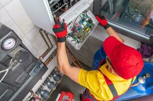 Residential Gas Heater Repair Performed by Professional Plumber photo