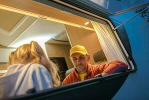 Caucasian Family Inside Camper Van photo