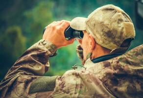 Spotting Game Using Binoculars photo