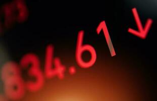 Current Stock Price in Red Trading Concept photo