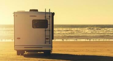 RV Motorhome Camping on a Beach photo