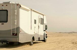 RV Motorhome Camping on a Beach photo