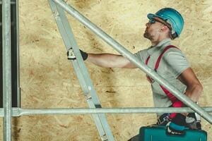 Construction Worker on Ladder photo