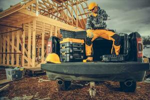 Construction Contractor on His Pickup Truck photo