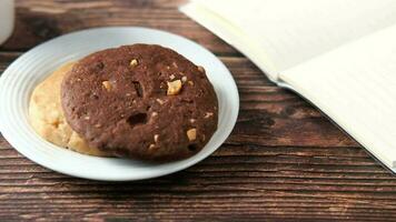 Close up of cookies and tea on table video