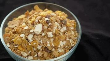 Home Made Musli in a bowl on black video