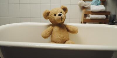 Teddy bear is sitting next to bathroom accessories photo