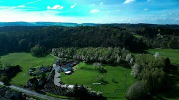 Aerial orbiting view of a hotel GT3 in hills video