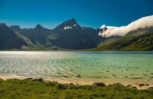 The Lofoten Summer Sunny Day with Sheltered Turquoise Bay. photo