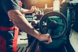 Lathe Machine Operator Performing Machining Operations photo