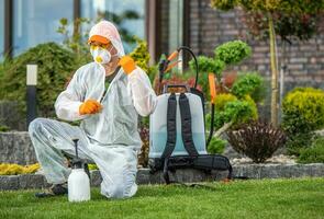 Gardener Preparing To Insecticide Garden Plants photo