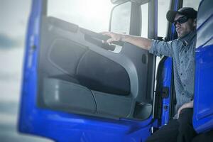 Proud Driver in His Truck photo