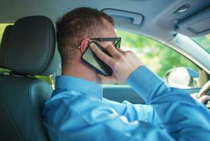 Talking by Phone While Driving photo