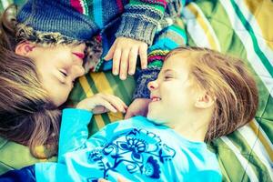 Loving Sisters Looking at each other photo