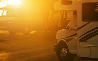 Motorhomes Inside RV Park During Scenic Sunset photo