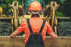 Worker and the Bulldozer photo