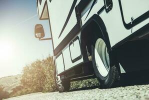 Recreational Class C Motorhome on the Side of a Road photo