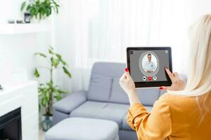 Doctor appointment online on screen. Medical and health care concept. photo