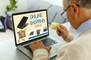 Businessman Using Laptop With Online Shopping Application On A Screen photo