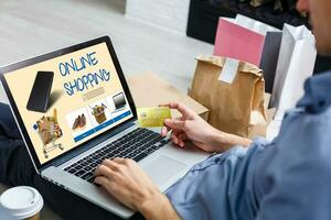 Businessman Using Laptop With Online Shopping Application On A Screen photo